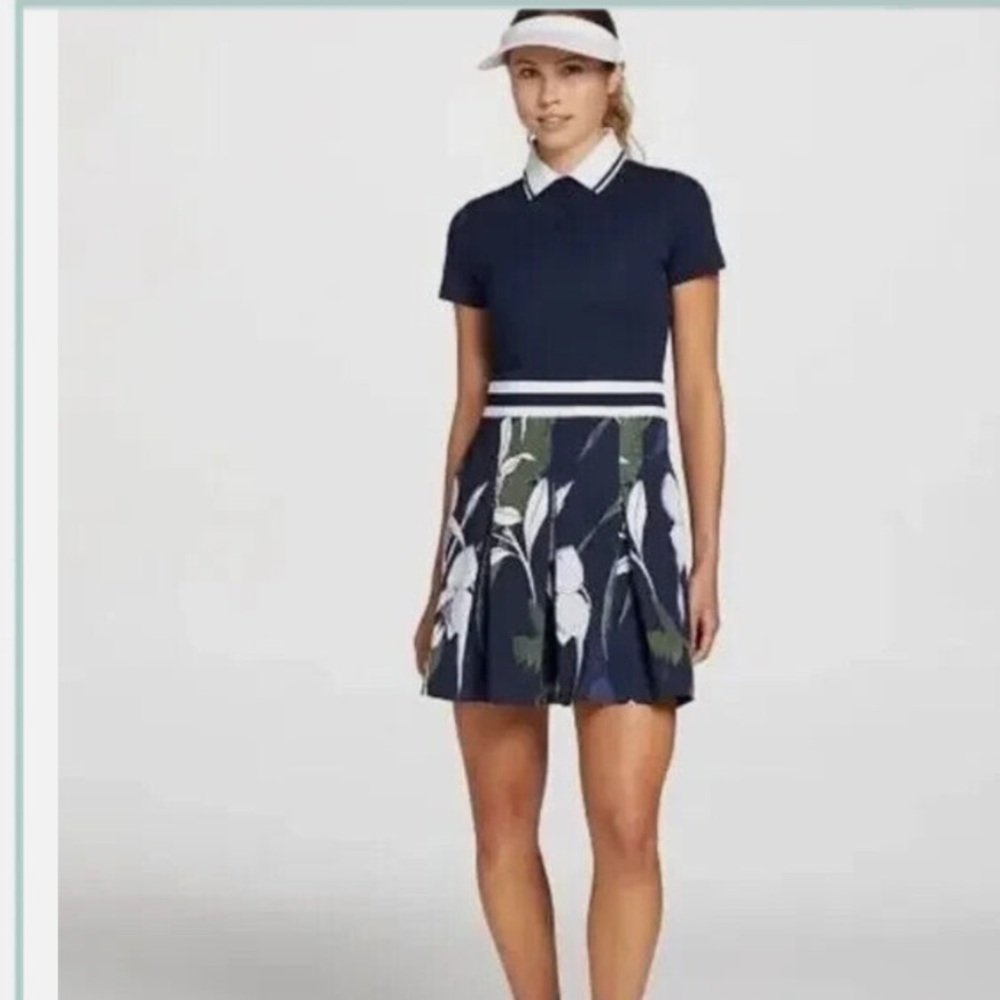 Lady Hagen Navy and White Golf/tennis Dress, with shorts.
Size XS, NWT